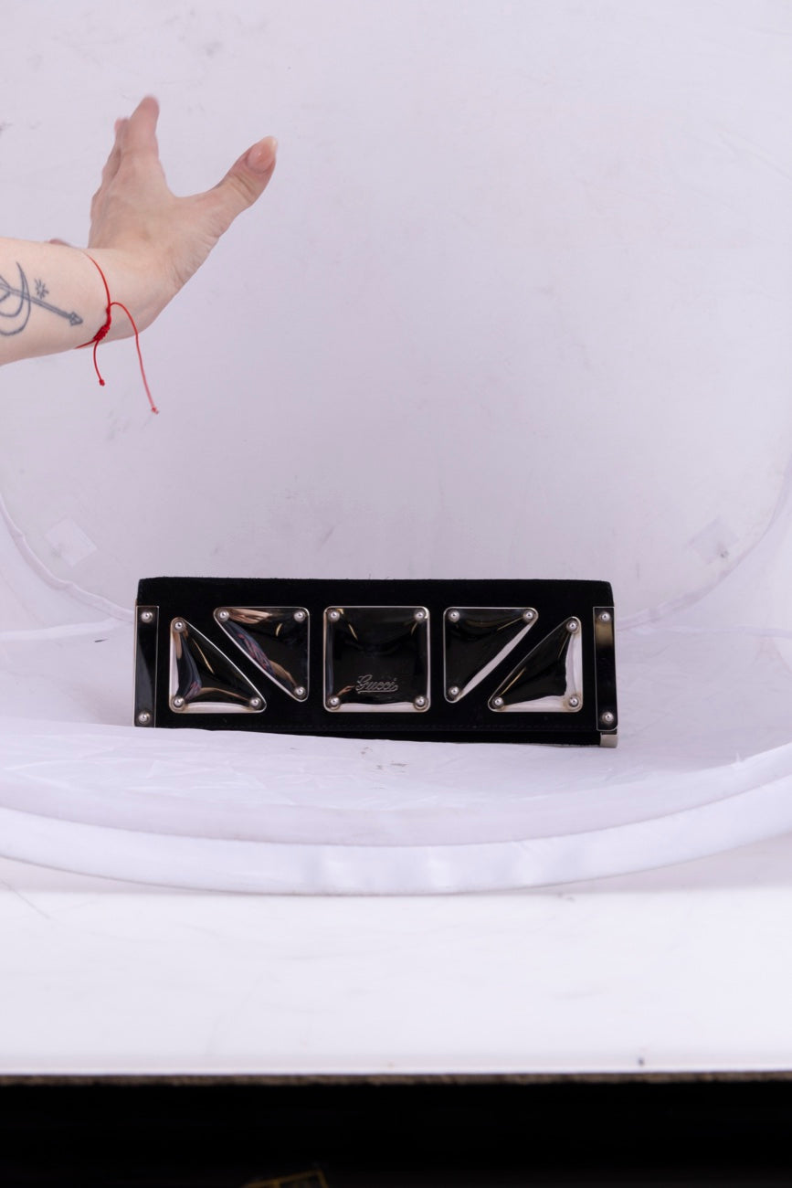 Gucci black pyramid clutch angle